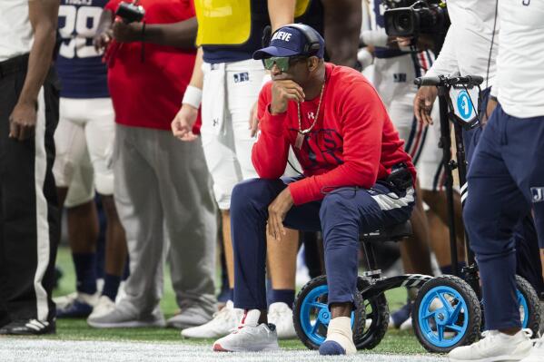 Deion Sanders has 2 toes amputated after medical setback AP News